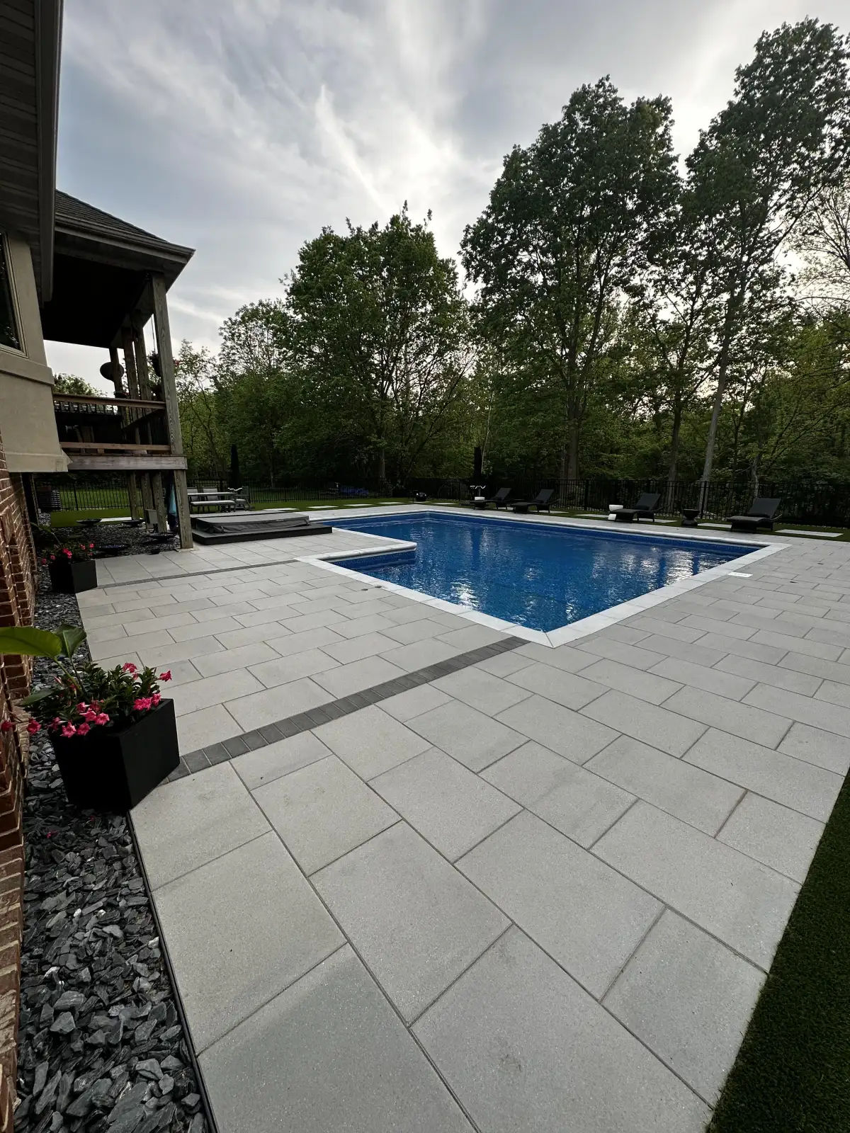 Paver patio installation detail for Cedar Ridge Outdoor Living